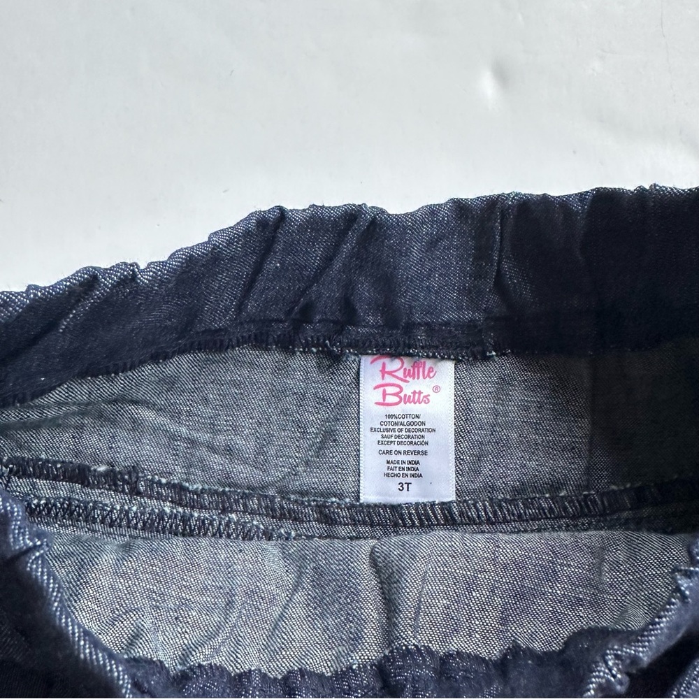 RuffleButts Ruffled Denim Bow Skirt - Picture 4 of 4